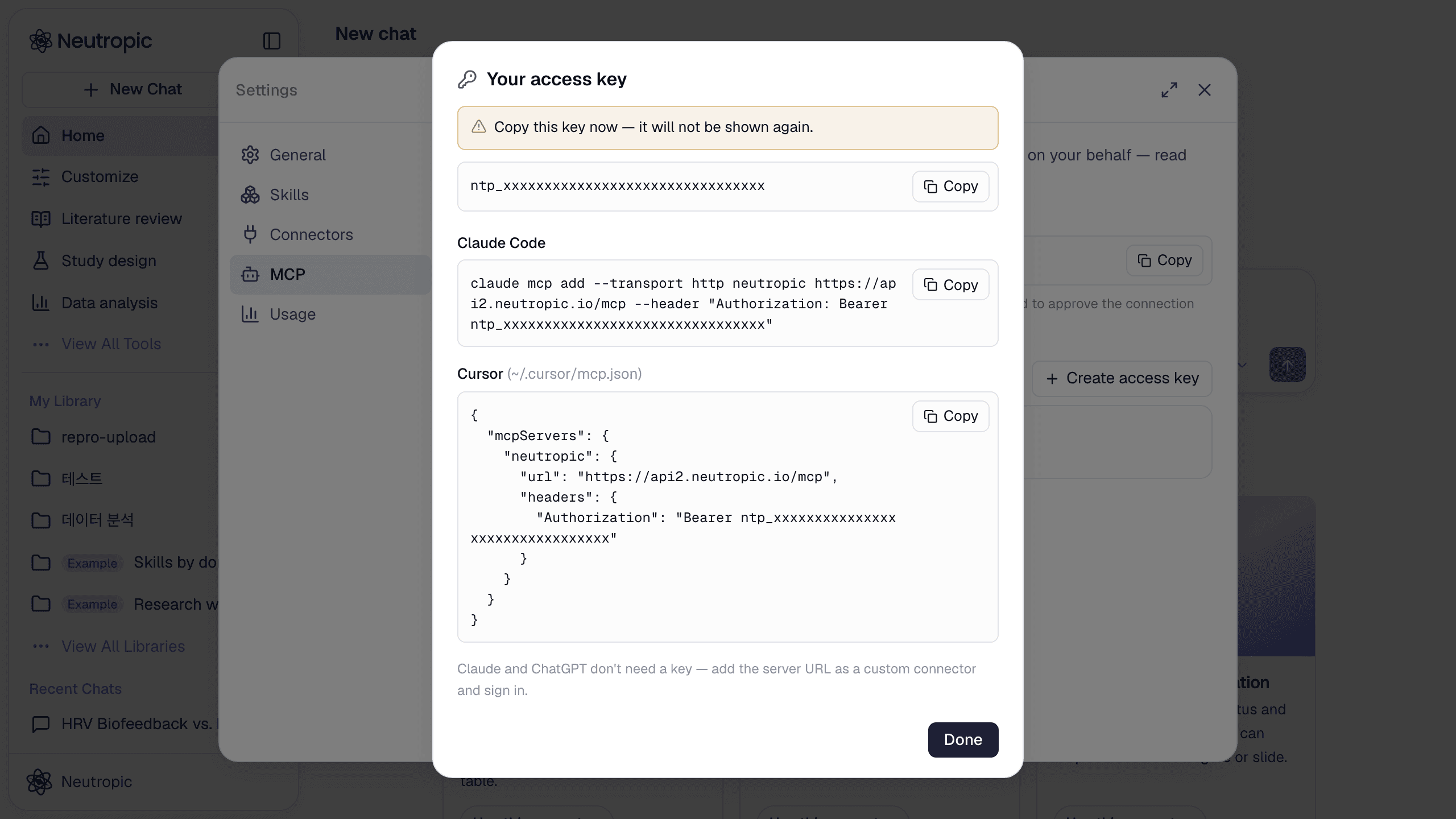 After creating a key: copy it now, plus the Claude Code command and the Cursor mcp.json snippet with the key filled in.